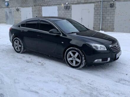 Чорний Опель Інсігнія, об'ємом двигуна 1.96 л та пробігом 300 тис. км за 10177 $, фото 1 на Automoto.ua