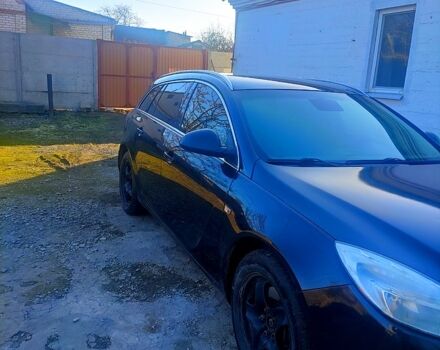 Черный Опель Инсигния, объемом двигателя 2 л и пробегом 296 тыс. км за 7300 $, фото 1 на Automoto.ua