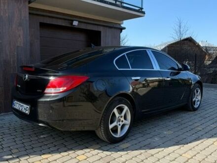 Черный Опель Инсигния, объемом двигателя 2 л и пробегом 282 тыс. км за 9500 $, фото 1 на Automoto.ua