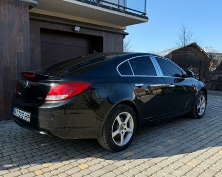 Чорний Опель Інсігнія, об'ємом двигуна 2 л та пробігом 282 тис. км за 9500 $, фото 1 на Automoto.ua