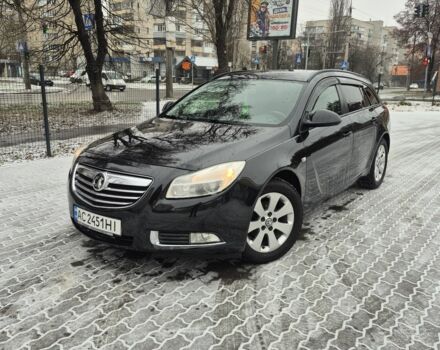 Черный Опель Инсигния, объемом двигателя 2 л и пробегом 259 тыс. км за 8200 $, фото 1 на Automoto.ua