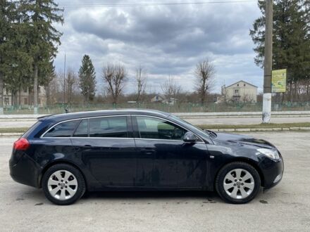 Чорний Опель Інсігнія, об'ємом двигуна 2 л та пробігом 300 тис. км за 7600 $, фото 1 на Automoto.ua