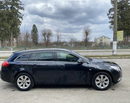 Чорний Опель Інсігнія, об'ємом двигуна 2 л та пробігом 300 тис. км за 7600 $, фото 1 на Automoto.ua