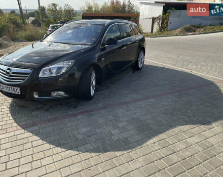Чорний Опель Інсігнія, об'ємом двигуна 2 л та пробігом 281 тис. км за 8200 $, фото 1 на Automoto.ua