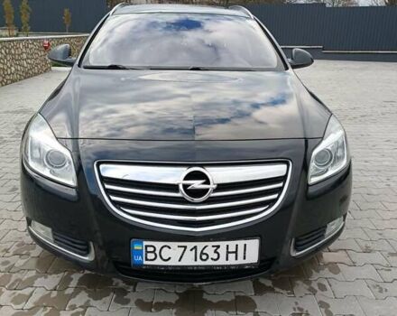 Чорний Опель Інсігнія, об'ємом двигуна 1.96 л та пробігом 300 тис. км за 7700 $, фото 1 на Automoto.ua
