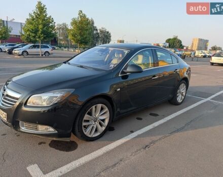 Чорний Опель Інсігнія, об'ємом двигуна 2 л та пробігом 280 тис. км за 7800 $, фото 1 на Automoto.ua