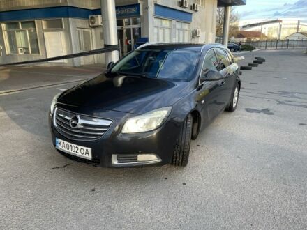 Черный Опель Инсигния, объемом двигателя 2 л и пробегом 300 тыс. км за 7700 $, фото 1 на Automoto.ua