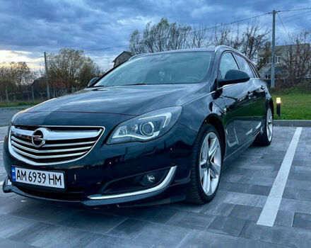 Черный Опель Инсигния, объемом двигателя 2 л и пробегом 243 тыс. км за 12500 $, фото 1 на Automoto.ua