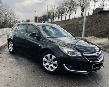 Черный Опель Инсигния, объемом двигателя 2 л и пробегом 258 тыс. км за 8500 $, фото 1 на Automoto.ua