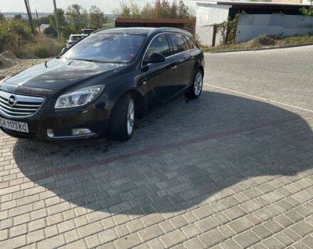 Чорний Опель Інсігнія, об'ємом двигуна 2 л та пробігом 281 тис. км за 8200 $, фото 1 на Automoto.ua