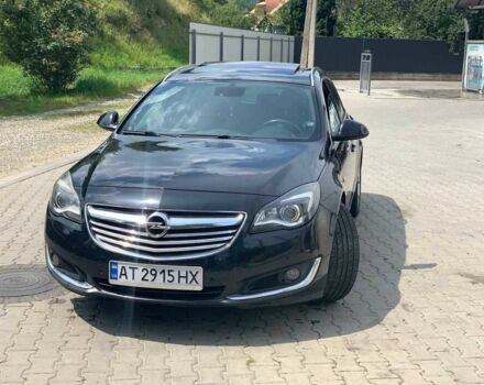 Чорний Опель Інсігнія, об'ємом двигуна 2 л та пробігом 140 тис. км за 13500 $, фото 1 на Automoto.ua
