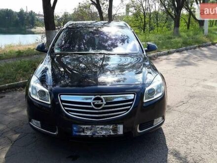 Черный Опель Инсигния, объемом двигателя 2 л и пробегом 222 тыс. км за 9300 $, фото 1 на Automoto.ua