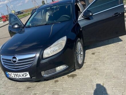 Чорний Опель Інсігнія, об'ємом двигуна 1.96 л та пробігом 280 тис. км за 6999 $, фото 1 на Automoto.ua