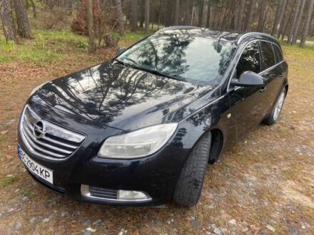 Чорний Опель Інсігнія, об'ємом двигуна 2 л та пробігом 270 тис. км за 8500 $, фото 1 на Automoto.ua