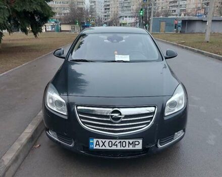 Черный Опель Инсигния, объемом двигателя 1.96 л и пробегом 380 тыс. км за 7500 $, фото 1 на Automoto.ua