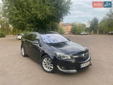 Черный Опель Инсигния, объемом двигателя 2 л и пробегом 173 тыс. км за 13999 $, фото 1 на Automoto.ua