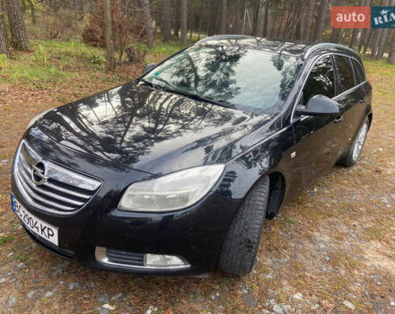 Черный Опель Инсигния, объемом двигателя 2 л и пробегом 270 тыс. км за 8800 $, фото 1 на Automoto.ua