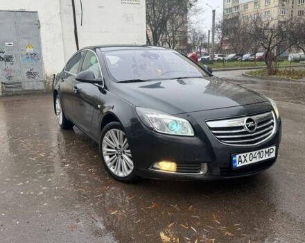 Черный Опель Инсигния, объемом двигателя 2 л и пробегом 266 тыс. км за 7700 $, фото 1 на Automoto.ua