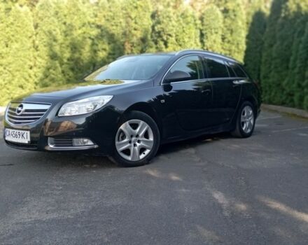 Чорний Опель Інсігнія, об'ємом двигуна 2 л та пробігом 236 тис. км за 8800 $, фото 1 на Automoto.ua
