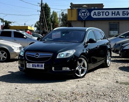 Чорний Опель Інсігнія, об'ємом двигуна 2 л та пробігом 211 тис. км за 9900 $, фото 1 на Automoto.ua