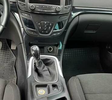 Чорний Опель Інсігнія, об'ємом двигуна 2 л та пробігом 240 тис. км за 10100 $, фото 1 на Automoto.ua