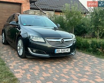 Чорний Опель Інсігнія, об'ємом двигуна 1.96 л та пробігом 180 тис. км за 9600 $, фото 1 на Automoto.ua