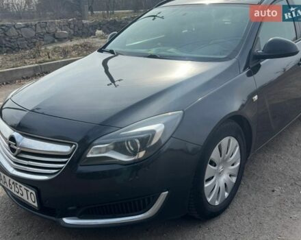 Чорний Опель Інсігнія, об'ємом двигуна 2 л та пробігом 320 тис. км за 9000 $, фото 1 на Automoto.ua