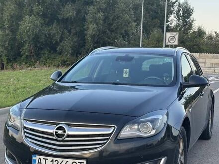 Чорний Опель Інсігнія, об'ємом двигуна 2 л та пробігом 243 тис. км за 9499 $, фото 1 на Automoto.ua
