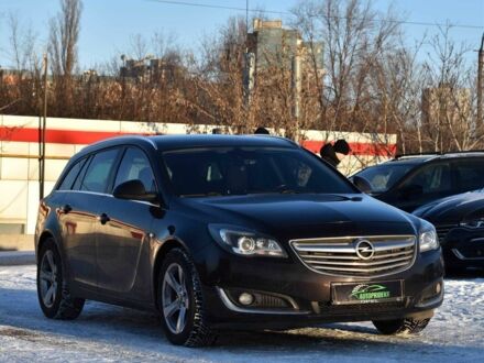 Черный Опель Инсигния, объемом двигателя 2 л и пробегом 219 тыс. км за 10950 $, фото 1 на Automoto.ua