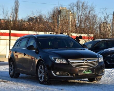 Черный Опель Инсигния, объемом двигателя 2 л и пробегом 219 тыс. км за 10950 $, фото 1 на Automoto.ua