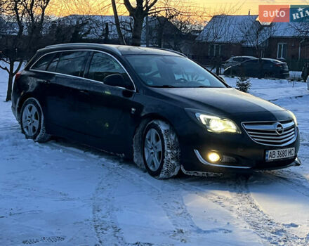 Чорний Опель Інсігнія, об'ємом двигуна 1.96 л та пробігом 172 тис. км за 10400 $, фото 1 на Automoto.ua