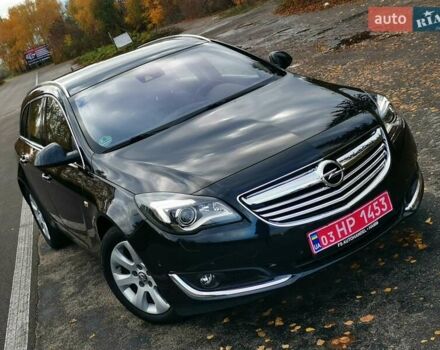 Чорний Опель Інсігнія, об'ємом двигуна 1.96 л та пробігом 205 тис. км за 12999 $, фото 1 на Automoto.ua