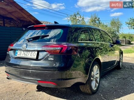 Черный Опель Инсигния, объемом двигателя 2 л и пробегом 231 тыс. км за 10200 $, фото 1 на Automoto.ua