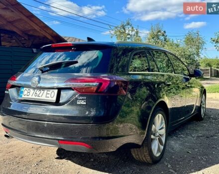 Черный Опель Инсигния, объемом двигателя 2 л и пробегом 231 тыс. км за 10200 $, фото 1 на Automoto.ua