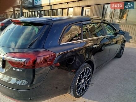 Черный Опель Инсигния, объемом двигателя 2 л и пробегом 290 тыс. км за 10000 $, фото 1 на Automoto.ua