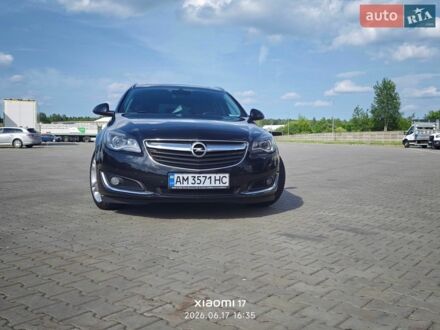 Чорний Опель Інсігнія, об'ємом двигуна 2 л та пробігом 220 тис. км за 10950 $, фото 1 на Automoto.ua