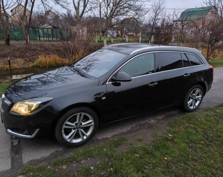 Чорний Опель Інсігнія, об'ємом двигуна 2 л та пробігом 255 тис. км за 10999 $, фото 1 на Automoto.ua
