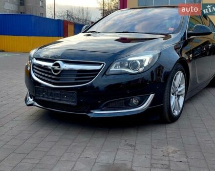 Черный Опель Инсигния, объемом двигателя 1.96 л и пробегом 191 тыс. км за 13700 $, фото 1 на Automoto.ua