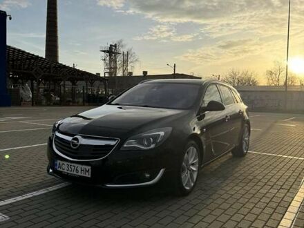 Черный Опель Инсигния, объемом двигателя 2 л и пробегом 160 тыс. км за 11900 $, фото 1 на Automoto.ua