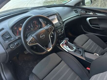 Черный Опель Инсигния, объемом двигателя 2 л и пробегом 140 тыс. км за 11500 $, фото 1 на Automoto.ua