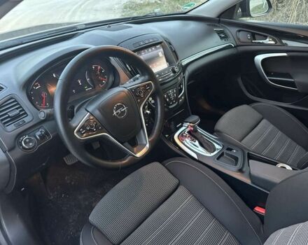 Черный Опель Инсигния, объемом двигателя 2 л и пробегом 140 тыс. км за 11500 $, фото 1 на Automoto.ua