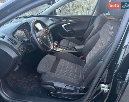 Черный Опель Инсигния, объемом двигателя 2 л и пробегом 140 тыс. км за 11500 $, фото 1 на Automoto.ua