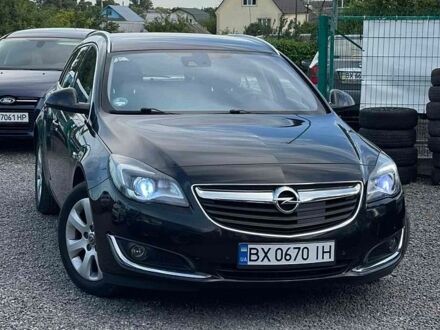 Чорний Опель Інсігнія, об'ємом двигуна 1.6 л та пробігом 195 тис. км за 11900 $, фото 1 на Automoto.ua