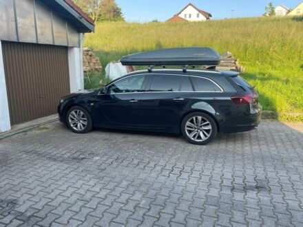 Черный Опель Инсигния, объемом двигателя 2 л и пробегом 219 тыс. км за 6386 $, фото 1 на Automoto.ua