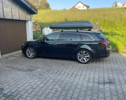 Черный Опель Инсигния, объемом двигателя 2 л и пробегом 219 тыс. км за 6386 $, фото 1 на Automoto.ua