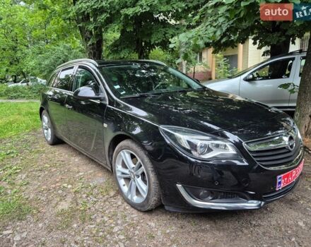 Чорний Опель Інсігнія, об'ємом двигуна 1.6 л та пробігом 230 тис. км за 11700 $, фото 1 на Automoto.ua