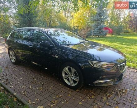 Чорний Опель Інсігнія, об'ємом двигуна 2 л та пробігом 180 тис. км за 15200 $, фото 1 на Automoto.ua