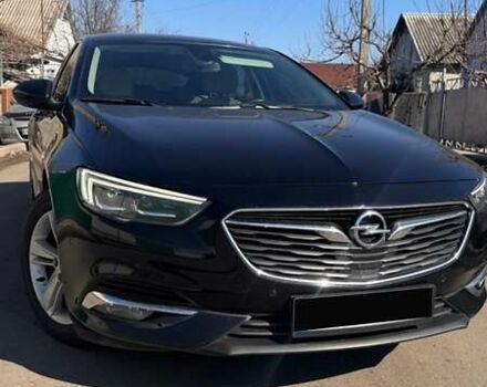 Черный Опель Инсигния, объемом двигателя 2 л и пробегом 215 тыс. км за 15900 $, фото 1 на Automoto.ua
