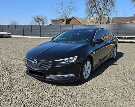 Чорний Опель Інсігнія, об'ємом двигуна 1.96 л та пробігом 121 тис. км за 19999 $, фото 1 на Automoto.ua