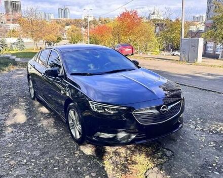 Черный Опель Инсигния, объемом двигателя 1.96 л и пробегом 118 тыс. км за 19900 $, фото 1 на Automoto.ua